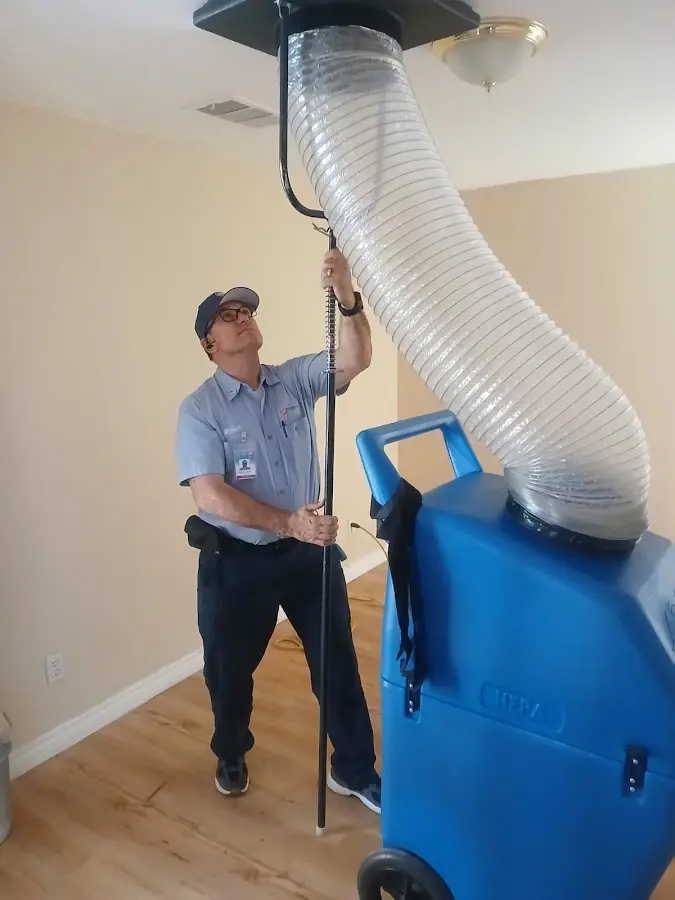 HVAC Installation technician using HEPA equipment in Bee Cave
